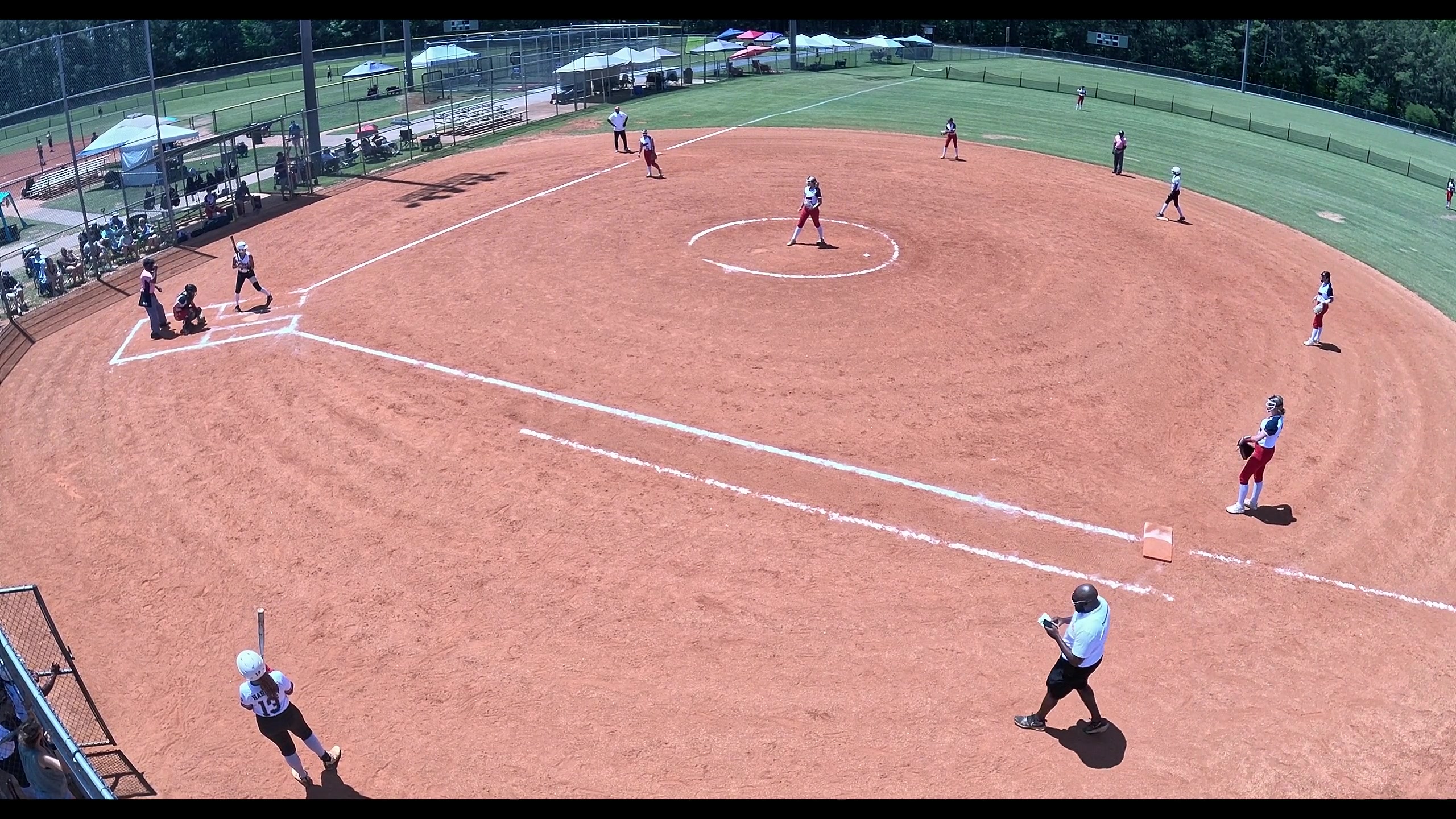 A tight frame on the diamond and the mound as the pitch is delivered