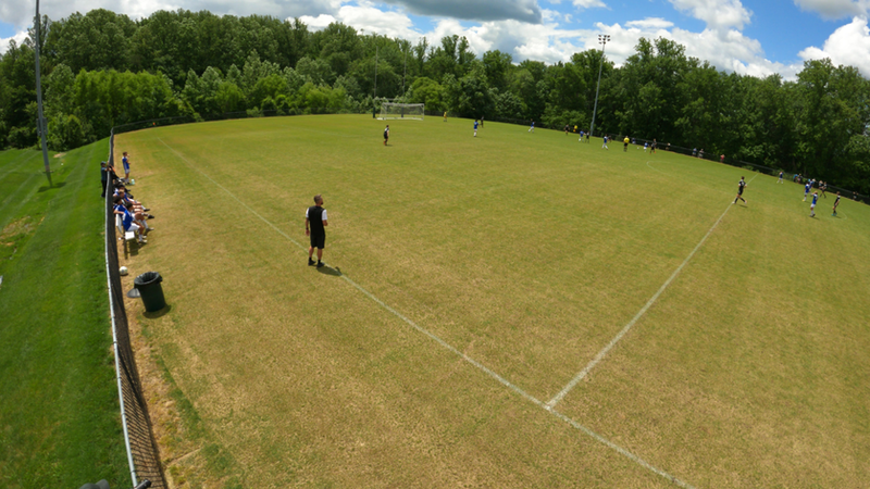 Wide-angle GoPro footage with small far-side players